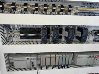Allen-Bradley PLC racks inside a control container